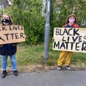 Victoria Murray and Grace Stubbings stage their protest