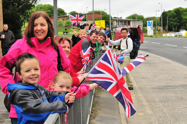 Waiting for the torch relay to pass Peterlee town centre.