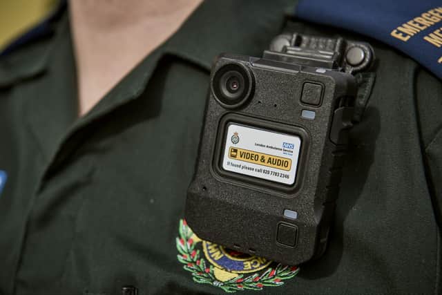Handout photo issued by NHS England of Emergency Ambulance Crew member Gary Watson who works for London Ambulance Service in Croydon, wearing a body camera. Gary was violently assaulted by a drunk patient in January 2018, while on duty. T