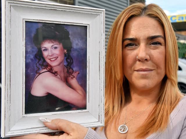 Tammy Gibson holding a photograph of her late mum Kim Goodrich, outside of the Corporation Club in Whitby Street, where she is holding a charity event in her memory./Photo: Frank Reid