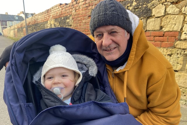 Stephen Sanderson with his grandson Kitt stop to have their picture taken during their Headland walk.