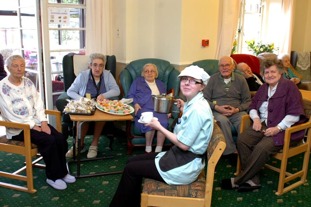 Catering assistant, Danielle Howie, pours a cup of tea and coffee for the residents of the Four Winds Care Home during their coffee morning in 2013. Pictured are Audrey Allen, Janet Alderson, Evelyn Hutchinson, Ingram Hutchinson and Muriel Morgan.