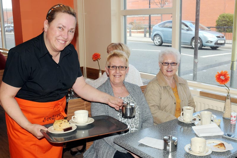 Manager Lisa Jacobs pictured serving customers Trish Rayne and Syheila Butcher at the newly opened Eugene's cafe  on Park Road in 2013.