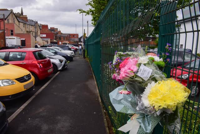Floral tributes have been left at the scene./Photo: Kevin Brady