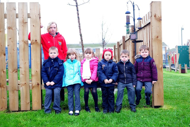 School teacher Sharon Pearson with Key Stage 1 pupils (left to right) Ellis Cameron, Ella Creevy, Gracie Parker, Charlie James, Caleb Evand and Joshua Stamper. Who remembers this at St Helen's Primary School 8 years ago?