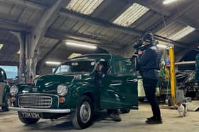 John Arkley in the Morris Minor van at his Graythorp site being filmed for the new series of Bangers and Cash: Restoring Classics.