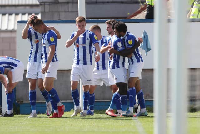Hartlepool United's Tyler Burey celebrates with his team mates after scoring their first goal during the Sky Bet League 2 match between Hartlepool United and Carlisle United at Victoria Park, Hartlepool on Saturday 28th August 2021. (Credit: Mark Fletcher | MI News)