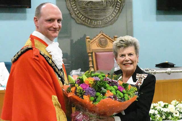 The ceremonial mayor of Hartlepool, Shane Moore, presents flowers to the Lord Lieutenant of County Durham, Sue Snowdon.