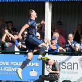 Callum Cooke celebrates with Hartlepool United fans after scoring at Oxford City earlier this season.