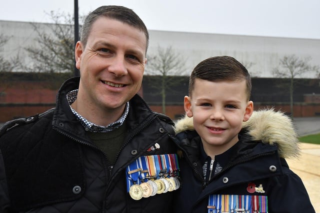 Simon Wood with his son Lennox (5). Remembrance Day parade Victory Square, Hartlepool. Picture by FRANK REID
