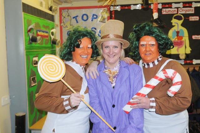 Jane Dolphin dresses as Willy Wonka and stands alongside her Oompa Loompa's Nicola Kenny and Julie Callaghan in 2013.