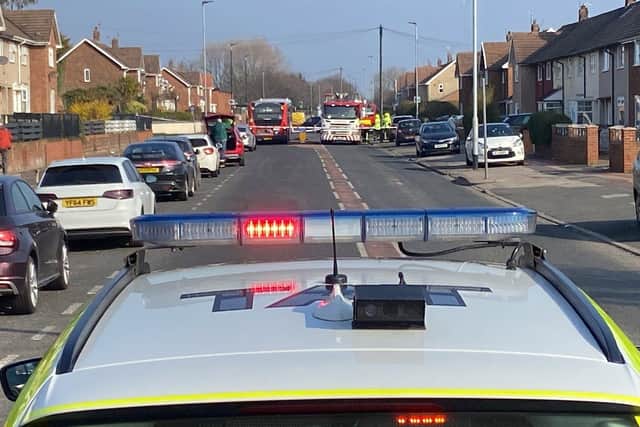 The scene in Catcote Road, Hartlepool, of a fatal road traffic collision involving a bus. One pedestrian died and a second suffered serious injuries.