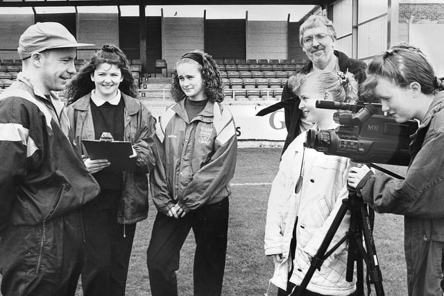 Pupils at Brierton school interview Hartlepool United star, Brian Honour, as part of their anti-vandalism video project in May 1993.