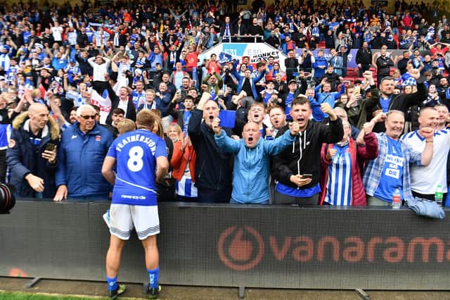 Hartlepool's Nicky Featherstone with fans after the final whistle at Ashton Gate on Sunday - with the town's MP praising both fans and the club for the success in securing promotion back to the Football League in dramatic fashion. Picture by Frank Reid