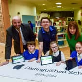 From left: headteacher Phil Pritchard, technology and innovation lead Simon Curtin, deputy headteacher Rebecca Nicholson and IT technician Josh Brown with pupils (left to right) Noah Turnbull, Nicola Wallace, Macey Woodhall and Elijah Wilson.