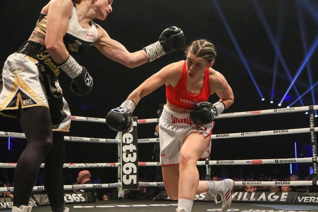 Savannah Marshall and Femke Hermans exchange blows in the main event of Boxxer's Newcastle show. Picture by Martin Swinney