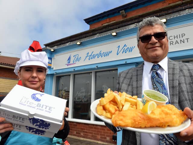 Darab Rezai, chairman of Hartlepool Licensees Association and owner of The Harbour View, at Hartlepool Marina, with staff member Chantelle Alton.