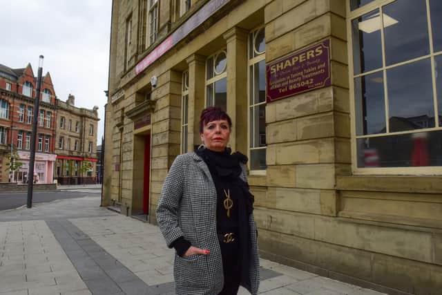 Lynne Devine outside her salon Shapers for Devine Hair and Beauty,  in Church Square, Hartlepool.
