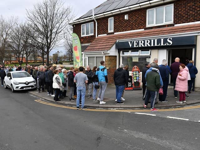 A queue of people outside Verrills fish and chip shop, on the Headland, in 2023.