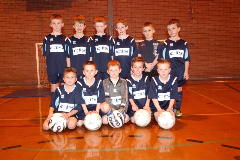 St Francis under 9s club team proudly wear a new strip in 2008.