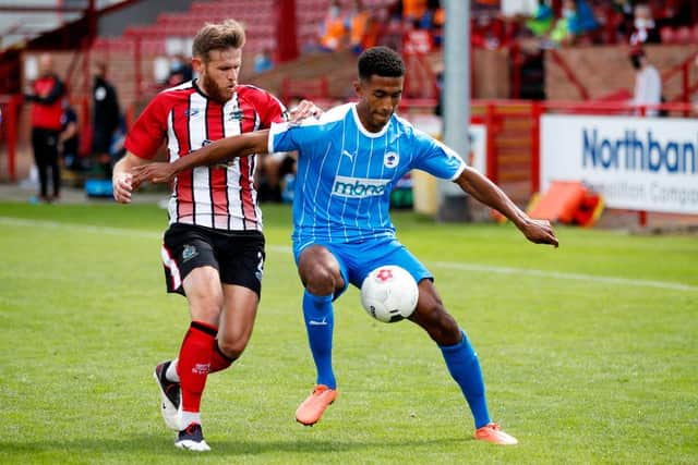 Danny Elliott of Chester in action with Andrew White of Altrincham during the Vanarama National League North Play-Off match between Altrincham and Chester at  on July 19, 2020 in Altrincham, England. (Photo by Clive Brunskill/Getty Images)