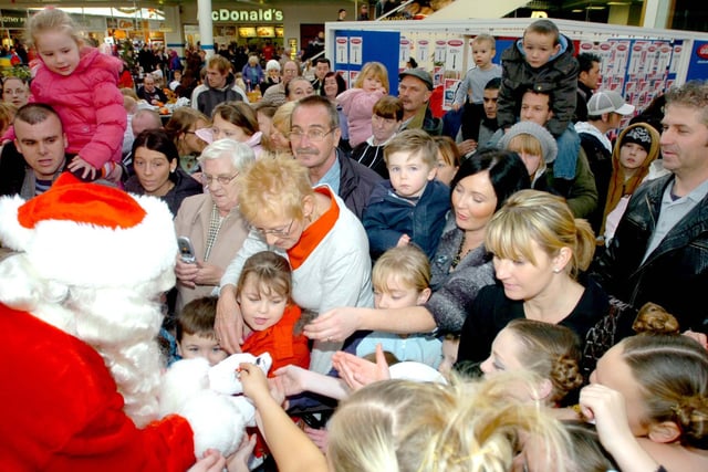 Crowds of families flocked to see Father Christmas at the opening of his grotto in Middleton Grange shopping centre in 2008.