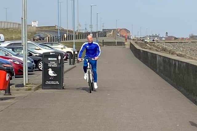 A lone cyclist takes some exercise on Hartlepool prom near Seaton Carew on Tuesday, March 24.