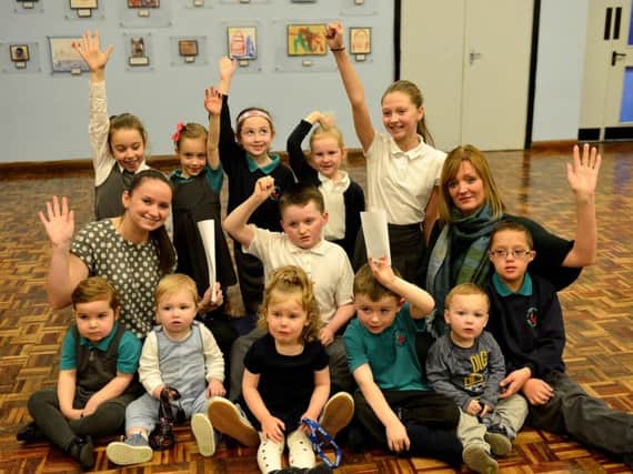 St John Vianney Primary School staff Jennifer Wright Y6 teacher (left) and Faye Marshall Y5 teacher with pupils Lucas Bestford, Elodie Megs, Noah Wilson, Melody Musgrave, Madeline Wood, Obeline Thorpe, Henry Moore, Tilly Off, James Fewster-Smith, Mia Caden and Matilda Brackstone.