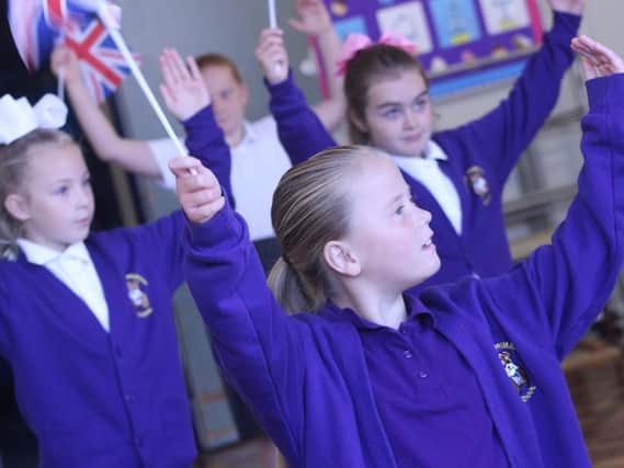 Grange Primary School pupils are put through their paces as they rehearse for Honoured.