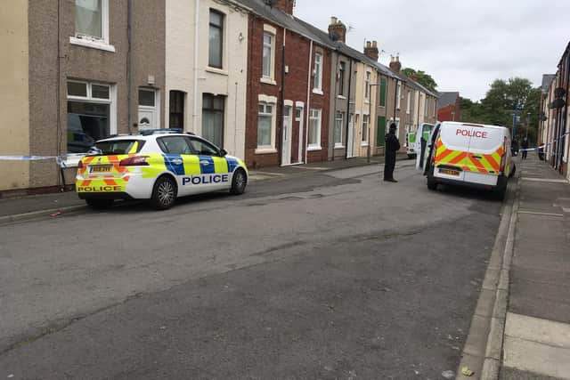 Police in Rydal Street, Hartlepool, on Tuesday, as a murder inquiry is launched.