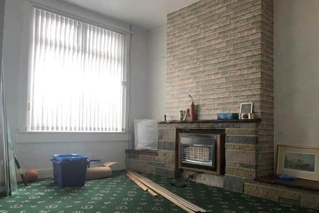The chimney breast and gas fire looks like they would need some attention
