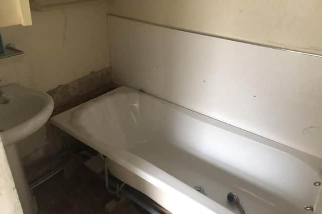 The bath appears new, but still needs fitting