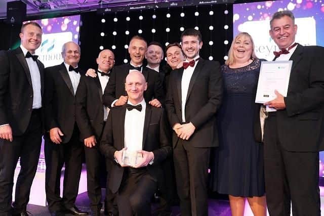 Councillor Shane Moore, Leader of Hartlepool Borough Council, (front centre) and members of the Engineering Department celebrate success at the CENE 2019 Awards.