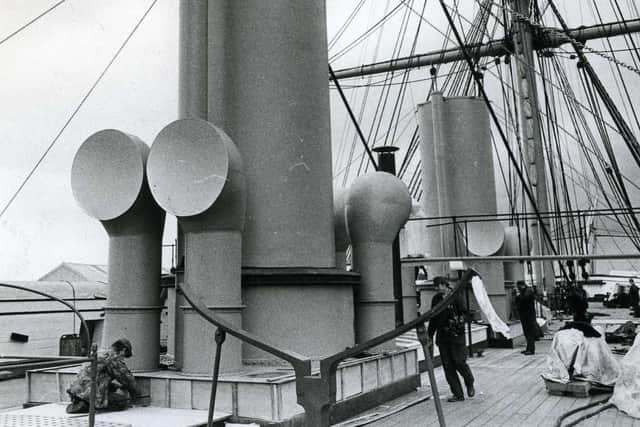 The funnels make a dominant sight in this view of the deck of the ironclad giant.