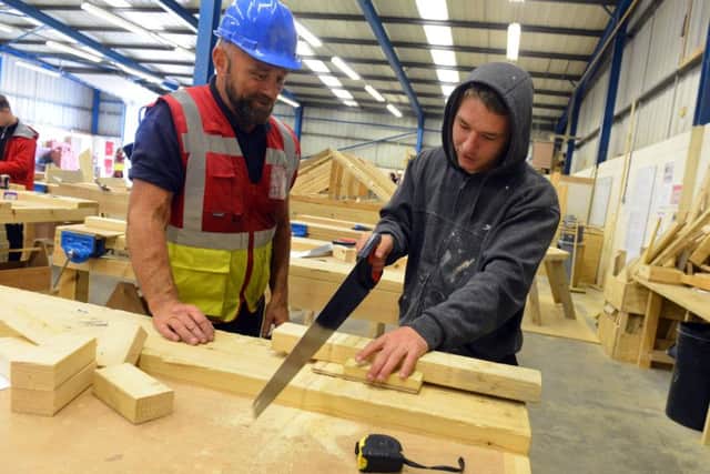 Scott McDonnell takes part in the joinery taster session.