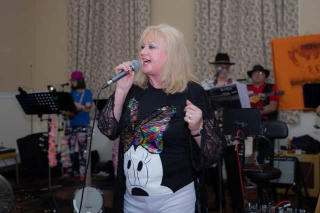 Phoenix Variety Showgroup member Linda Edmenson singing during the fundraising night. Picture Ashley Foster