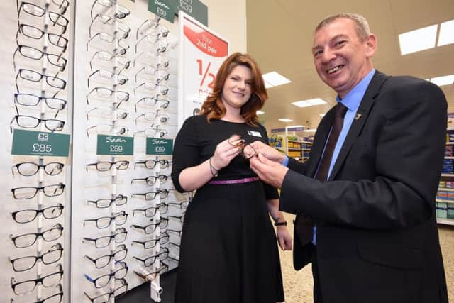 Vision Express at Tesco store manager Georgie Ritchie and Hartlepool MP Mike Hill.