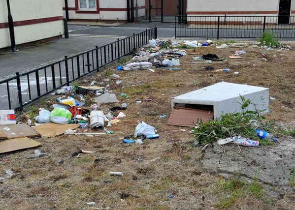 Items dumped on the former site of the Co-op shop at the junction of Raby Road and Young Street.