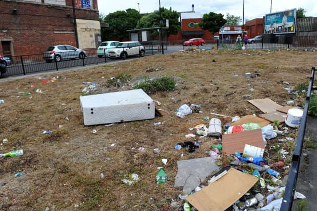 Items dumped on the former site of the Northeastern Co-op shop at the junction of Raby Road and Young Street Picture by FRANK REID