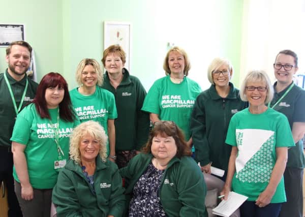 Volunteers with the Macmillan cancer information support service.