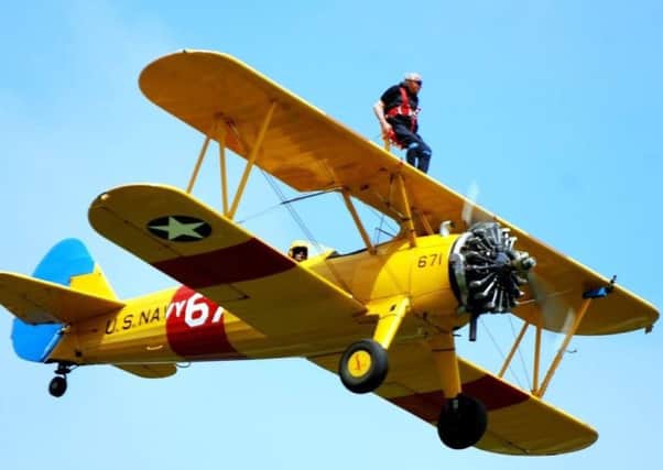 Tom doing the wing walk. Photo by Tom's nephew Garry Brown.