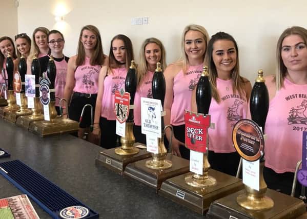 The rugby club's bar staff are getting ready for the big weekend.