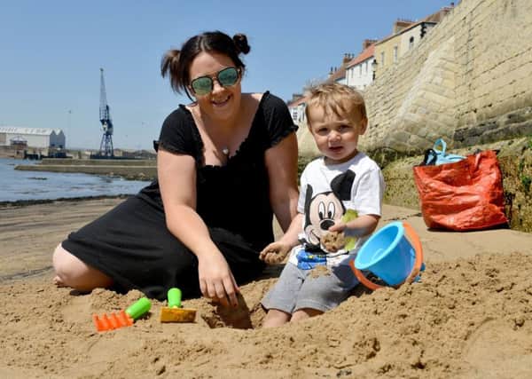 Nicola Battram (30) with her son Jacob (2) at  the Fish Sands. Picture by FRANK REID
