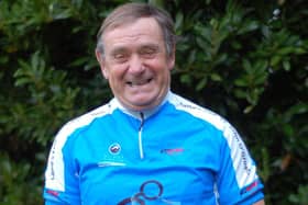 Mike Rainton after receiving an award and trophy for completing his sixth Land's End to John O'Groats ride