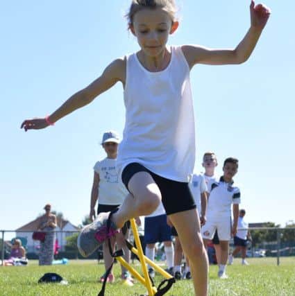 A pupil becomes tangled up during the Sacred Hearts Primary school sports day held at Grayfields. Picture by Frank Reid