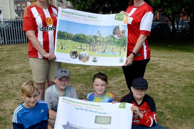 Headteacher Joanna Clark (rear left) along with Lynn Murphy (Bradley Lowery Foundation) and Blackhall Primary School pupils Noah Dixon, Tom Pattison, Ashton Amerigo and Harrison Lewis with the plans for the Bradley Lowery legacy project.