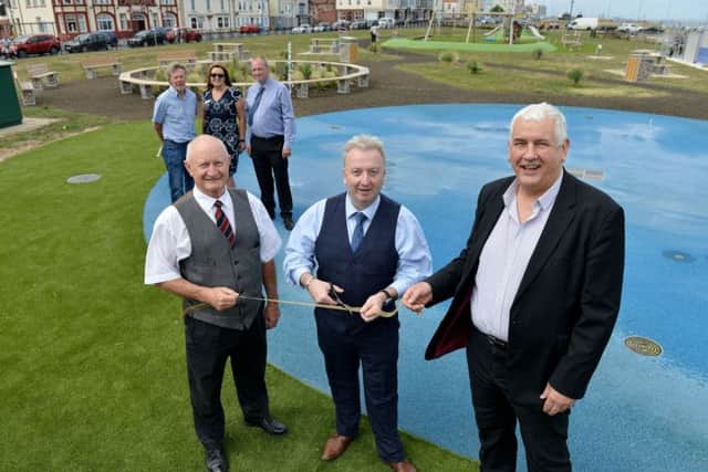 Front left to right, Peter Stephenson (Able UK), Christopher Akers-Belcher (leader of Hartlepool Borough Council) and Kevin Cranny (deputy leader of Hartlepool Borough Council) cut the ribbon to open the play area as (rear left to right) Keith Marrison (Hartlepool Borough Council), Denise Ogden (Director for Regeneration & Neighbourhoods) and Jonathan Hanson (Deerness Fencing and Landscaping).