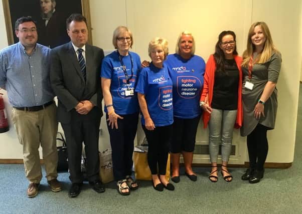 From left: Councillors Mike McLaughlin and Stephen Thomas, Julie Compton of the Motor Neurone Disease Association, Sandra Hamilton, Michelle Moran, Jayne Donkin and MND social worker Charlotte Roberts.