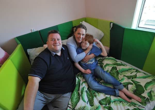 Victoria Edmundson-Brown and Peter Kelly with son Benjamin, at their Easington Colliery home.