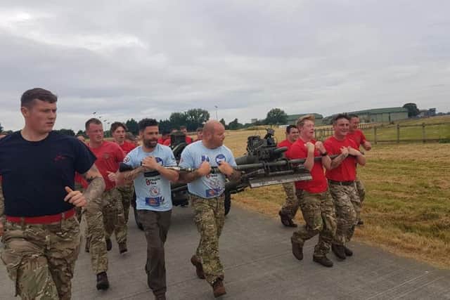 Miles For Men's Rob Collier and Michael Day training with members of 88 Arracan battery Royal Artillery.